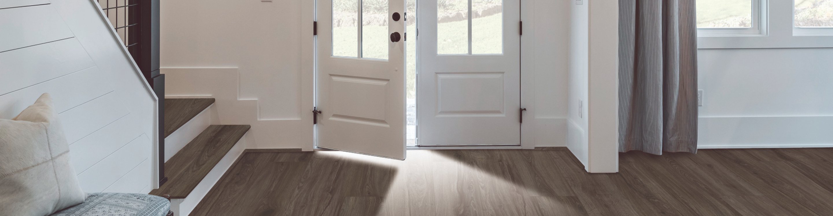 Wood-look luxury vinyl flooring in an entryway